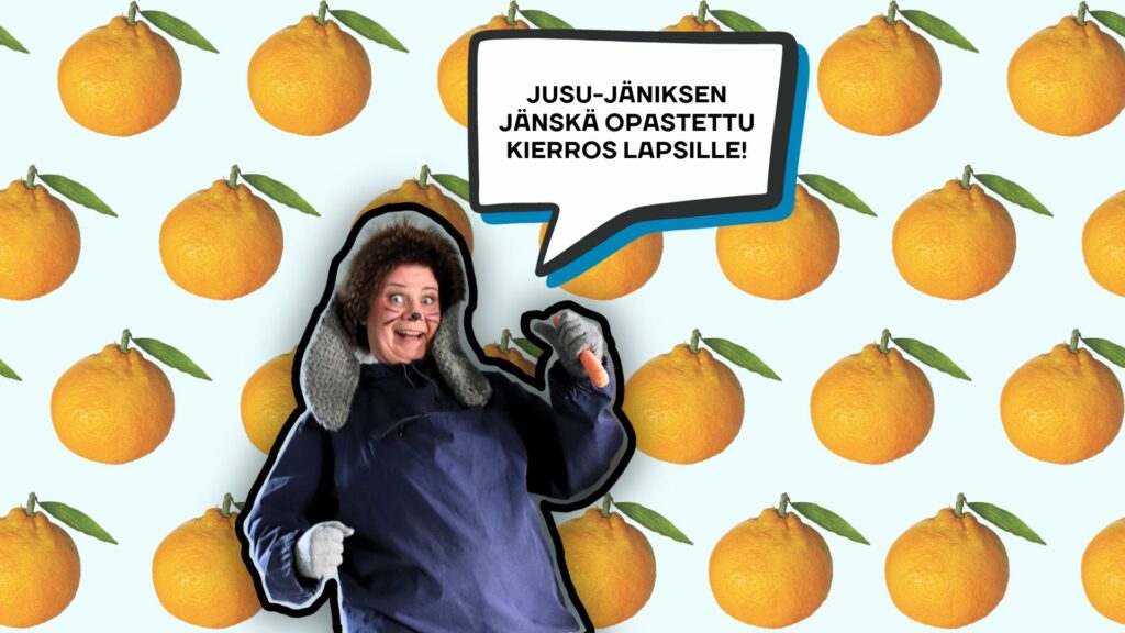 Värikuva oppaasta, joka on pukeutunut jänikseksi. Taustalla hedelmiä.